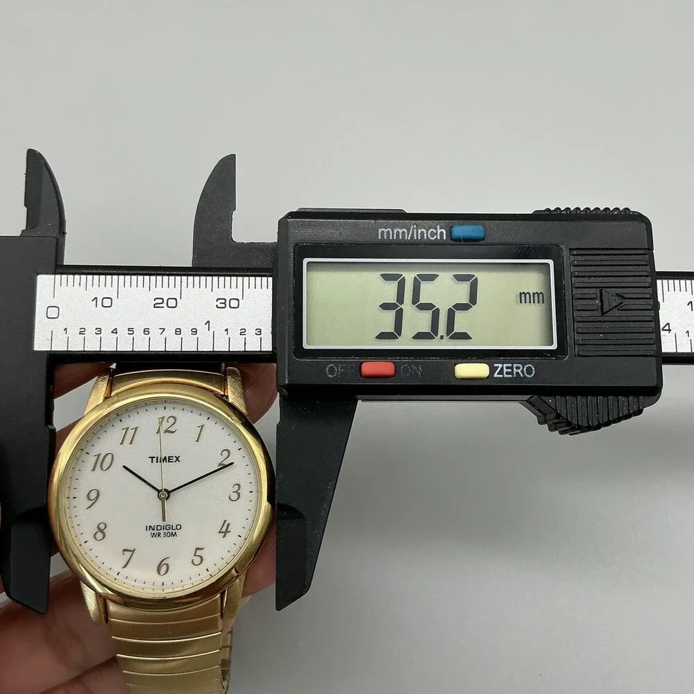Timex Indiglo Mens Watch 35mm White Dial Gold Tone Stretch Bracelet New Battery